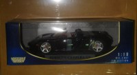 Масштабная модель 1:18 Спортивный легковой автомобиль Porsche Carrera GT, черный (MotorMax)
