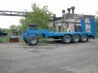 Сборная модель 1:43 Четырехосный отечественный прицеп-тяжеловоз ЧМЗАП-83991 для перевозки спецтехники (Клен)