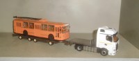 Сборная модель 1:43 Раздвижной низкорамный четырехосный полуприцеп-трал ТСМ-99394 для современных тягачей (Клен)