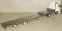 Сборная модель 1:43 Раздвижной низкорамный четырехосный полуприцеп-трал ТСМ-99394 для современных тягачей (Клен)
