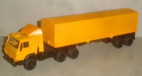 Масштабная модель 1:43 Седельный тягач 6х4 КамАЗ-5410 с обтекателем с двухосным полуприцепом ОдАЗ-9370, тент, желтый (Элекон)