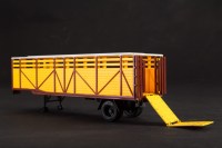 Масштабная модель 1:43 Одноосный полуприцеп-скотовоз ОДАЗ-857Б, желтый (Автоистория (АИСТ)
