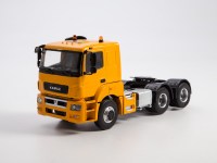 Масштабная модель 1:43 Седельный тягач 6х4 КамАЗ-65206 низкая крыша, новая оптика, желтый (Дилерская упаковка Автоистория (АИСТ) для ПАО КАМАЗ)