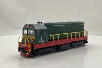 Масштабная модель 1:87 Чехословацкий маневровый тепловоз с электрической передачей ЧМЭ2-303 с журналом № (Наши Поезда. Modimio)