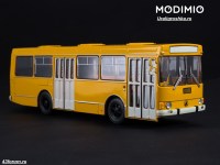 Масштабная модель 1:43 Городской автобус ЛАЗ-4202, желтый с журналом №12 (Наши Автобусы. Modimio)