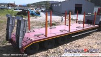 Сборная модель 1:43 Трехосный полуприцеп-тяжеловоз для вездеходных тягачей ЧМЗАП-990640-070 с шириной платформы 3 м и складными трапами (Клен)